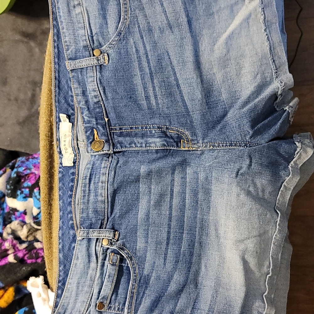 Torrid medium wash denim cuffed short shorts. EUC size 20.